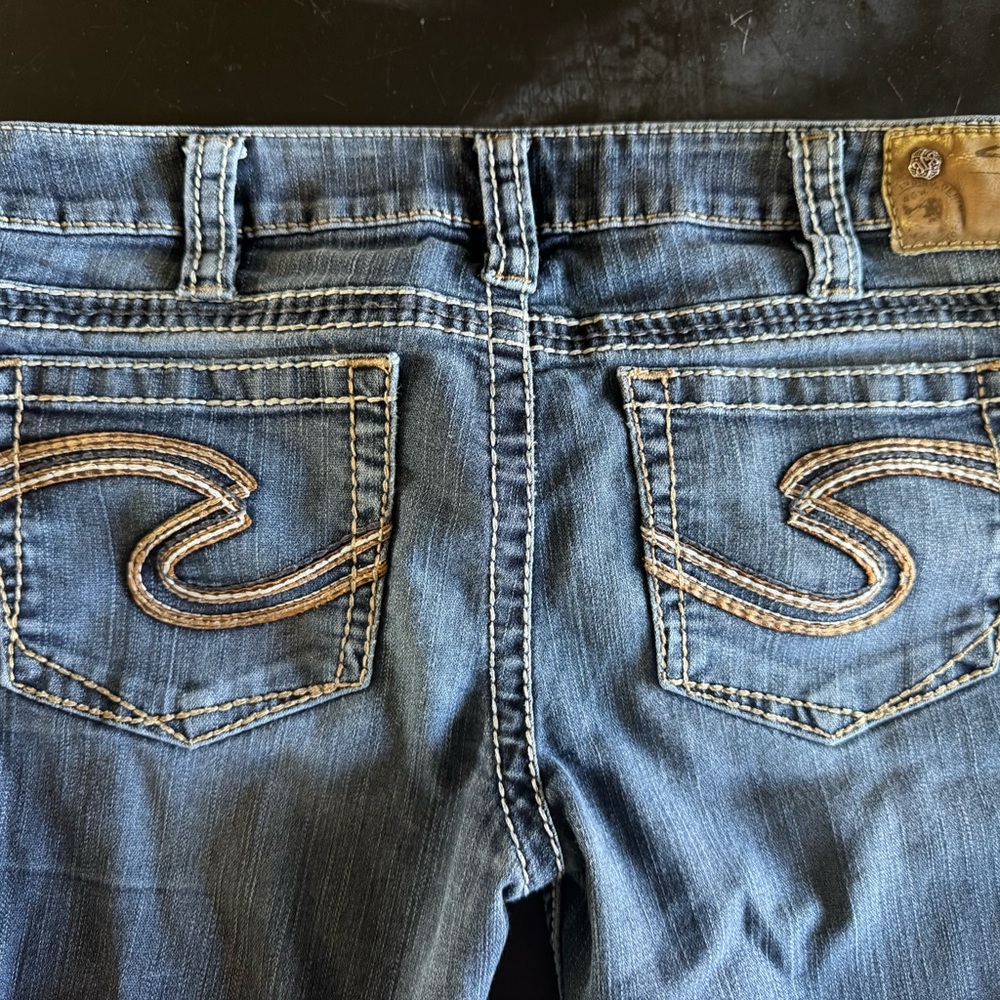 Silver Jeans Blue Boot Cut Denim with Signature Stitching